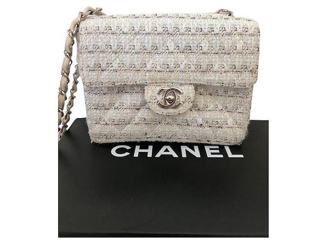 Mini bag Chanel in tweed bianco con hw . argento