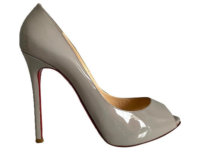 Christian Louboutin  heels. Grey