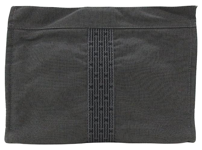 Hermès Clutch Tasche Grau Polyamid  ref.410690