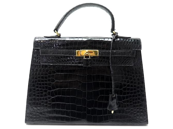 Hermès VINTAGE HERMES KELLY HANDBAG 33 BLACK GOLD POROSUS CROCODILE LEATHER HAND BAG Exotic leather  ref.410941