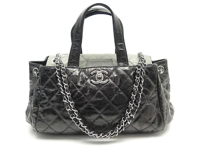 CHANEL SHOPPING HANDBAG TIMELESS CLASP IN BLACK AGED LEATHER HAND