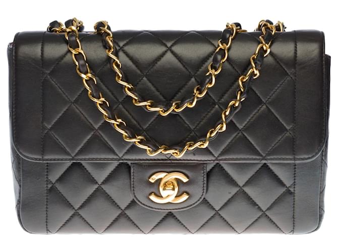 xSuperb Chanel Timeless / Classique single flap handbag in black quilted lambskin, garniture en métal doré Leather  ref.412338
