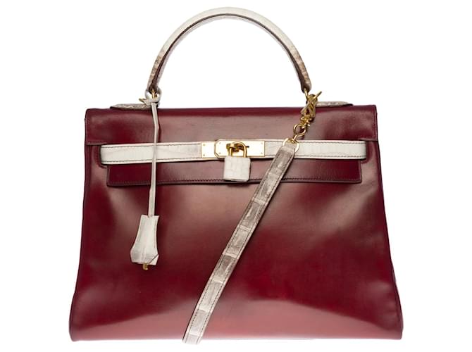 Hermès Exceptional Hermes Kelly bag 32 returned in burgundy box leather customized with the rare and highly sought-after Niloticus "Himalaya" crocodile Dark red  ref.415438