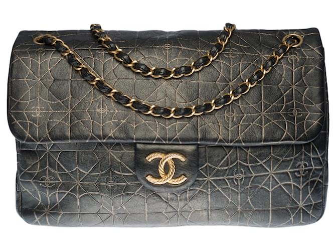 Sac bandoulière Chanel Classique Jumbo Flap bag série limitée en cuir d'agneau gaufré matelassé noir et or métallisé, garniture en métal doré  ref.415863