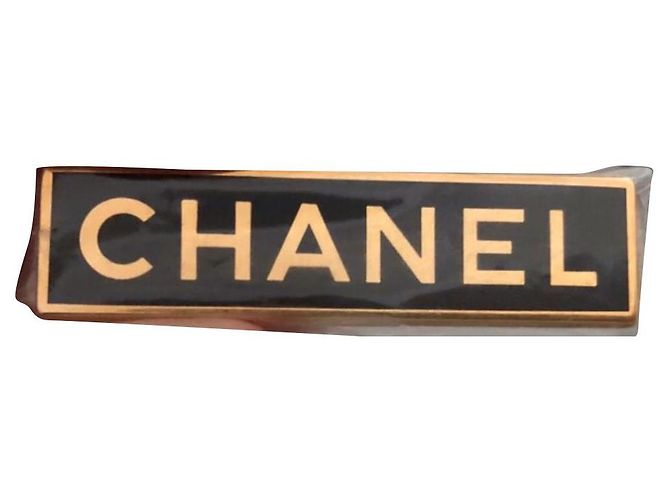 Chanel Alfileres y broches Dorado Metal