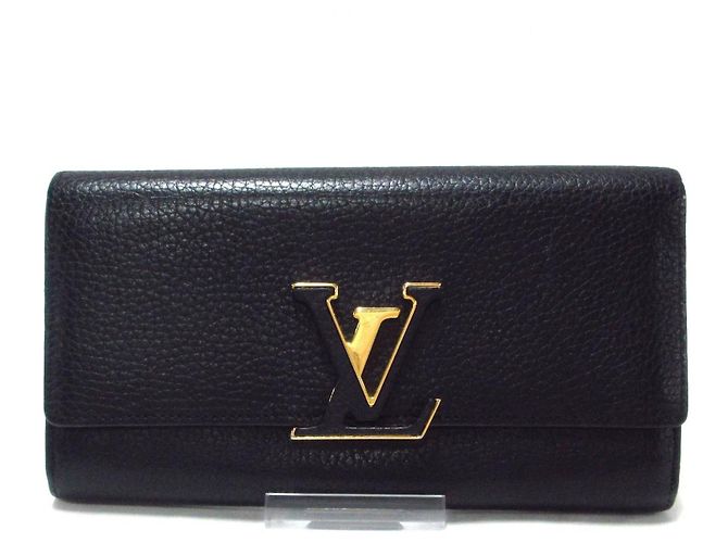 Capucines Louis Vuitton Purses, wallets, cases Black