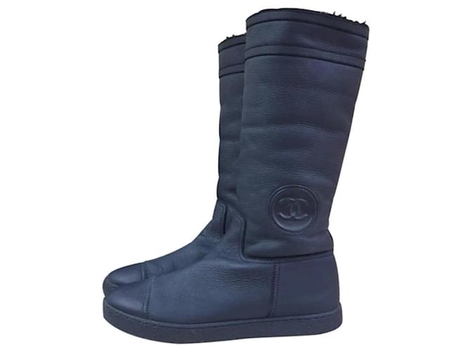 CHANEL Midi-Stiefel aus schwarzem Lammfell Blau Leder  ref.426543