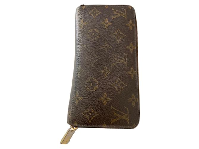 Louis Vuitton Monogramma Zippy Marrone scuro Pelliccia  ref.428830