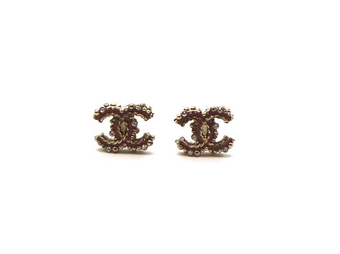 Boucles d'oreilles en émail CC cristaux d'or Chanel
