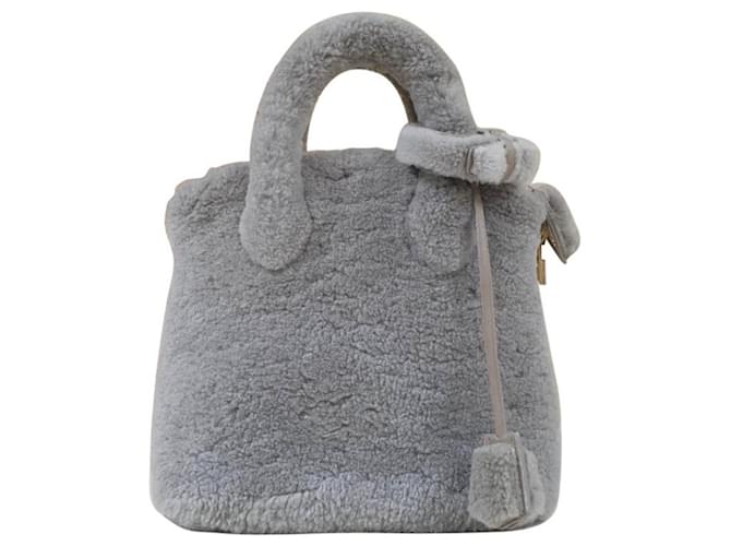 Louis Vuitton Sac cartable en peau de mouton gris Lockit Pulsion  ref.434920