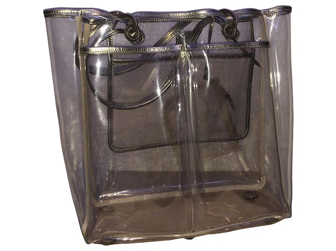 Cartera Anya Hindmarch de Acetato Dorado