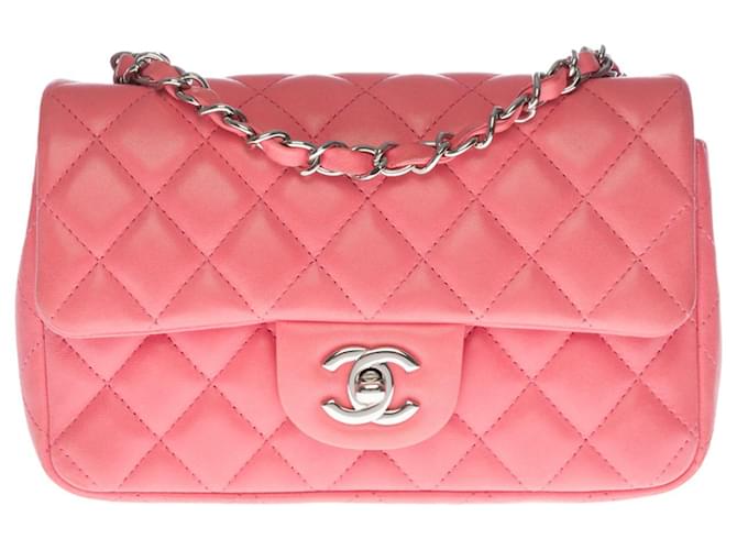 Superb Chanel Mini Timeless shoulder bag in pink quilted leather