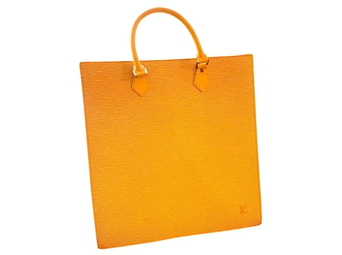 Louis Vuitton Signature bag: Louis Vuitton Paris Made in France. yellow  cob Leather ref.440057 - Joli Closet