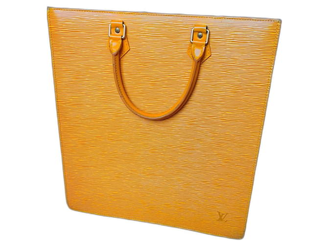 Louis Vuitton Signature bag: "Louis Vuitton Paris Made in France" yellow ear Leather  ref.440330