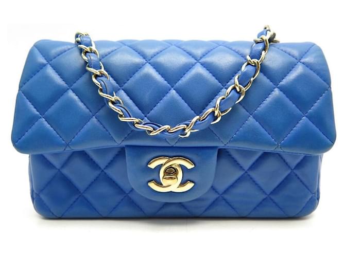 CHANEL MINI TIMELESS BANDOULIERE BLUE QUILTED LEATHER HAND BAG ref.440822 -  Joli Closet