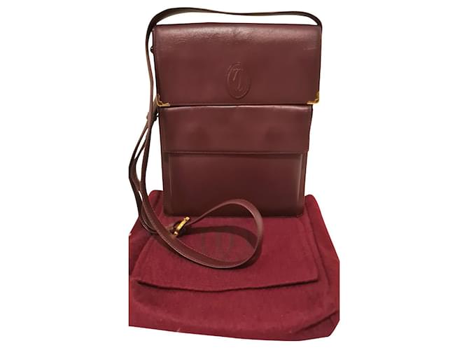 Cartier Saddlebags Dark red Leather  ref.442787