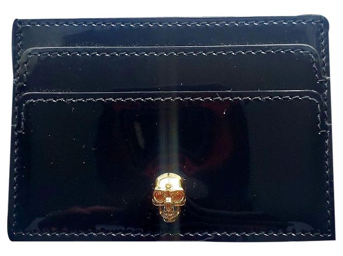 Alexander McQueen Tarjetero de piel charolada negra con calavera dorada Negro Gold hardware
