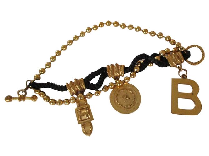 Balenciaga bracciale con ciondoli oro e nero D'oro