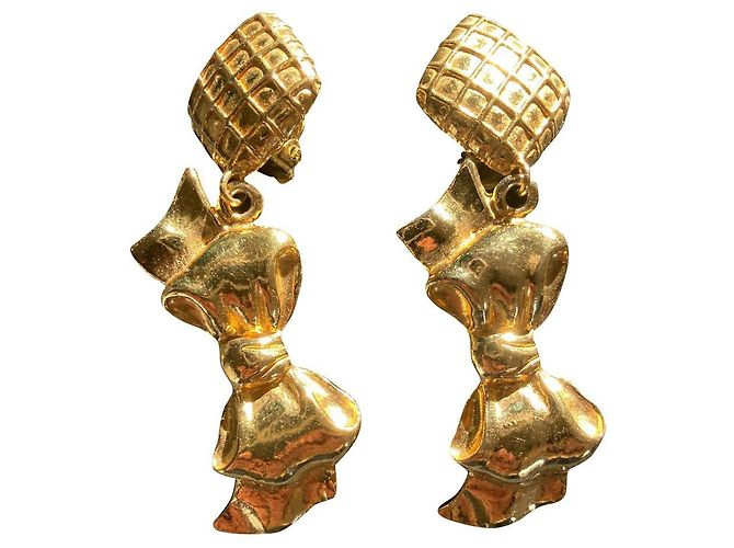 Orecchini a clip Chanel dorati in metallo D'oro