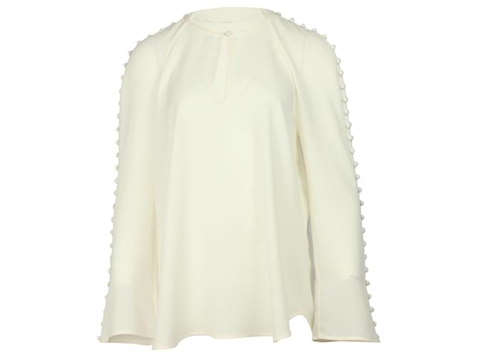 Zimmermann Long Sleeve Button Embellished Blouse in Cream Polyester White  ref.466298