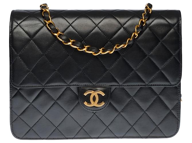 Timeless Splendid Chanel Classique Pochette Bolsa de ombro em couro matelassê preto, garniture en métal doré  ref.468968