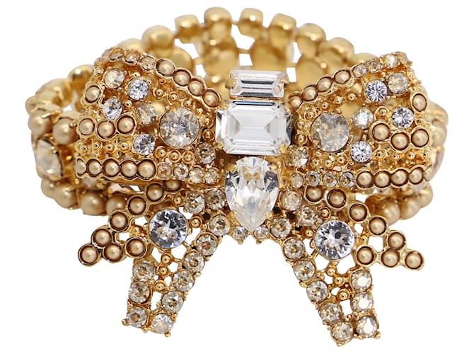 Bracelet Miu Miu oversize avec cristaux en métal plaqué or Doré  ref.471382