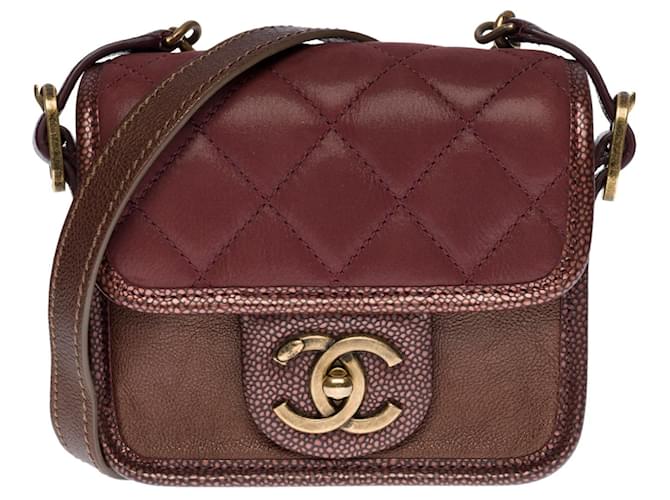Timeless Superb and original mini Chanel burgundy bag in partially quilted leather, hardware in aged gold metal Dark red  ref.475215