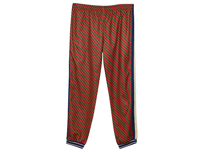 Gucci Pantalon de survêtement à rayures diagonales en polyester rouge  ref.477786