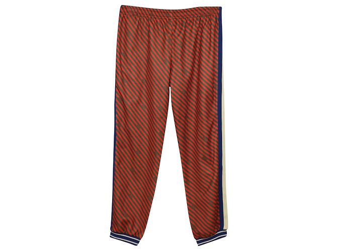 Gucci Trainingshose mit Diagonalstreifen aus rotem Polyester