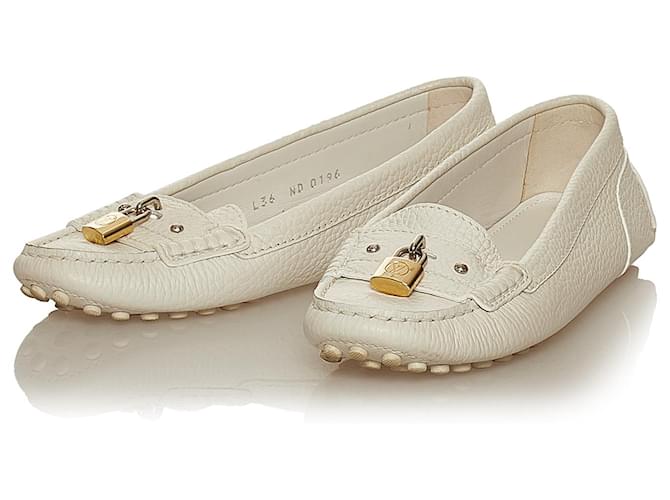 Louis Vuitton White Lock It Leather Loafers Golden Metal Pony-style  calfskin ref.485374 - Joli Closet