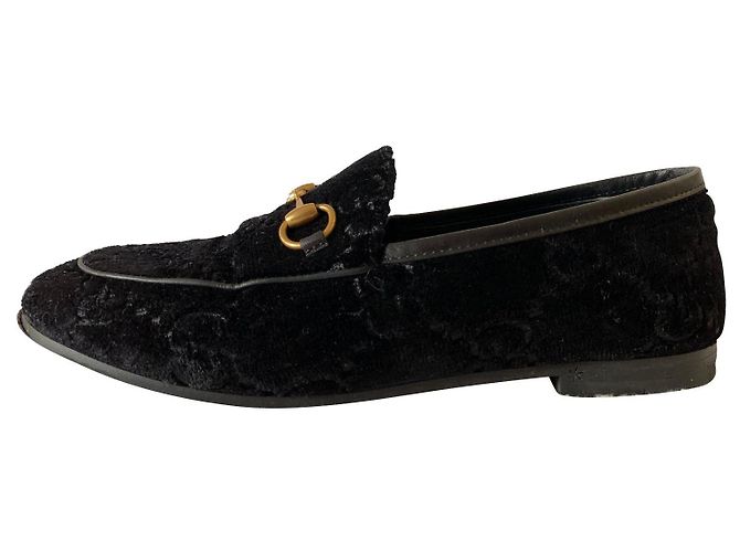 Mocassins Gucci en cuir noir avec mors doré
