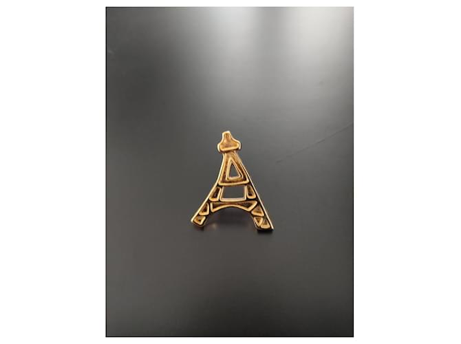 Broche Eiffel Tower Yves Saint Laurent Dorée 