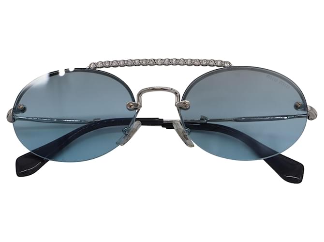 Óculos de sol ovais Miu Miu com barra de strass em metal azul claro  ref.488275