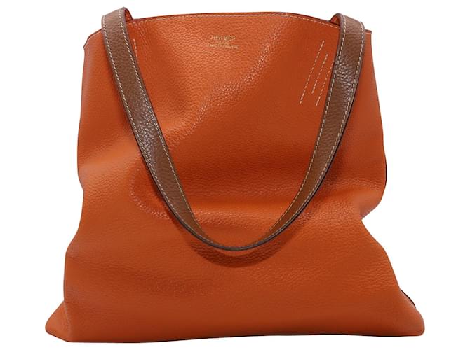 Double sens Hermès lined Sens Reversible Touch Bag in Brown and Orange  Clemence Leather ref.490154 - Joli Closet