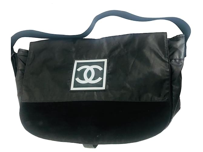Authentic Nylon Chanel Travel Bag in Black
