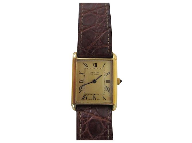 Reloj Lancel rectangular chapado en oro con correa de piel