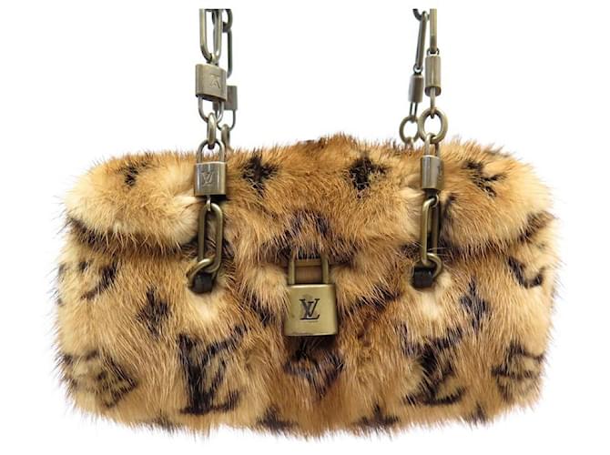 louis vuitton purse with fur