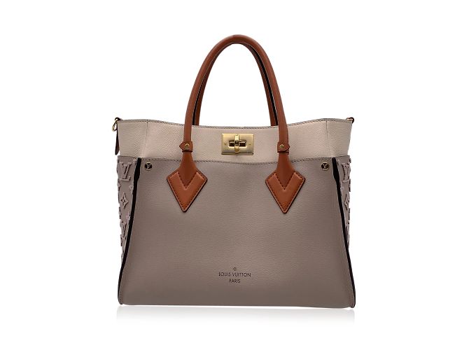 Twist Louis Vuitton Bolsa de couro bege no meu lado com alça