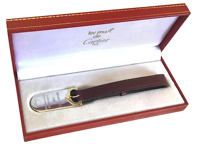 Must de Cartier Silvery Golden Dark red Leather Silver Gold-plated  ref.500250