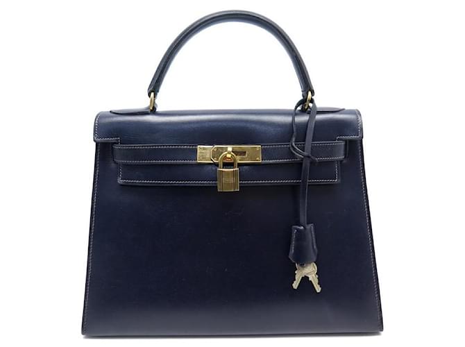 Hermès VINTAGE SAC A MAIN HERMES KELLY 28 SELLIER 1959 EN CUIR BOX BLEU NAVY HAND BAG Bleu Marine  ref.501009