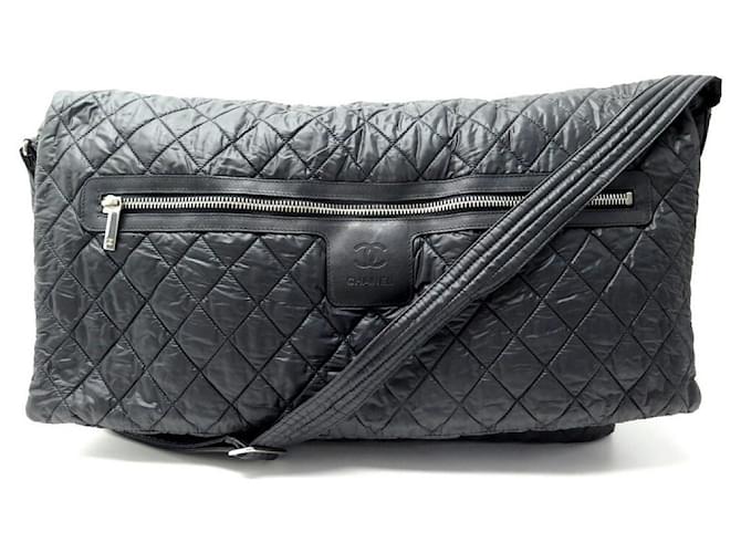 TRAVEL HANDBAGS CHANEL COCO COCOON XL QUILTED CANVAS BANDOULIERE BAG Black  Synthetic ref.501053 - Joli Closet