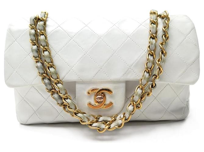 VINTAGE CHANEL CLASSIC TIMELESS PM HANDBAG IN QUILTED LEATHER HANDBAG White  ref.501070
