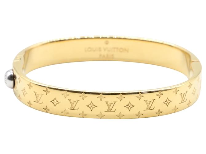 Louis Vuitton Nanogram Cuff Bracelet in Goldtone Brass Golden Metal  ref.504372 - Joli Closet