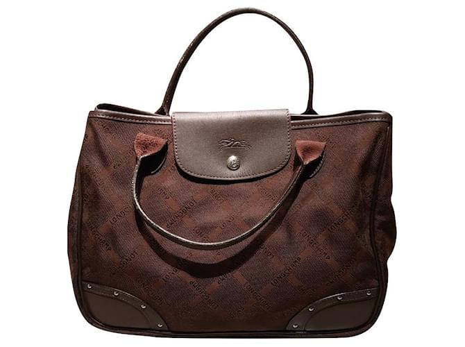 Longchamp Handbags Brown Leather Cloth  ref.504755