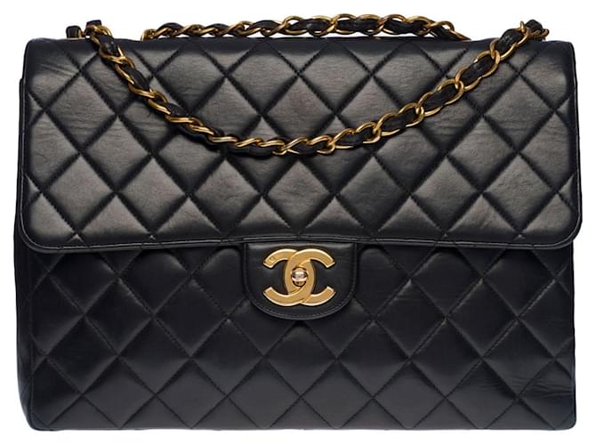 Classique Majestueux sac Chanel Timeless Jumbo single flap en cuir matelassé noir, garniture en métal doré  ref.505686