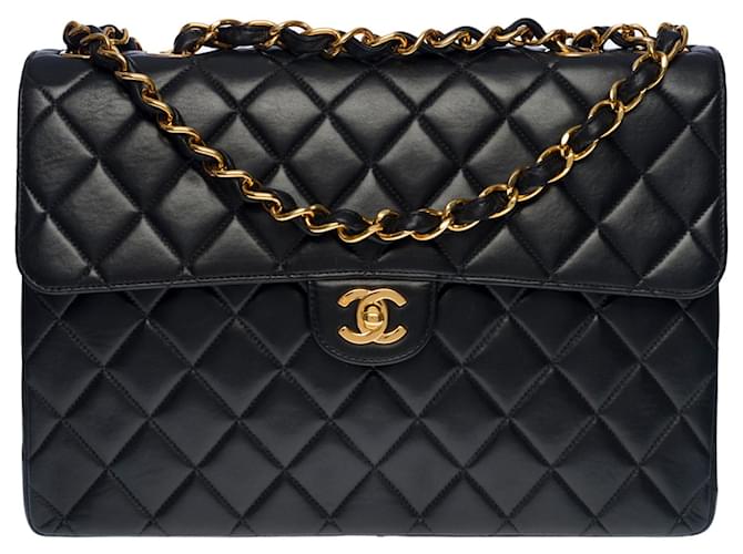 Classique Majestueux sac à main Chanel Timeless Jumbo single flap en cuir d’agneau matelassé noir, garniture en métal doré  ref.507865