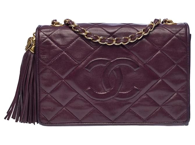 Espléndido bolso de mano vintage Chanel Full Flap Tassel en piel de cordero acolchada color ciruela, guarnición en métal doré Púrpura Cuero  ref.507983