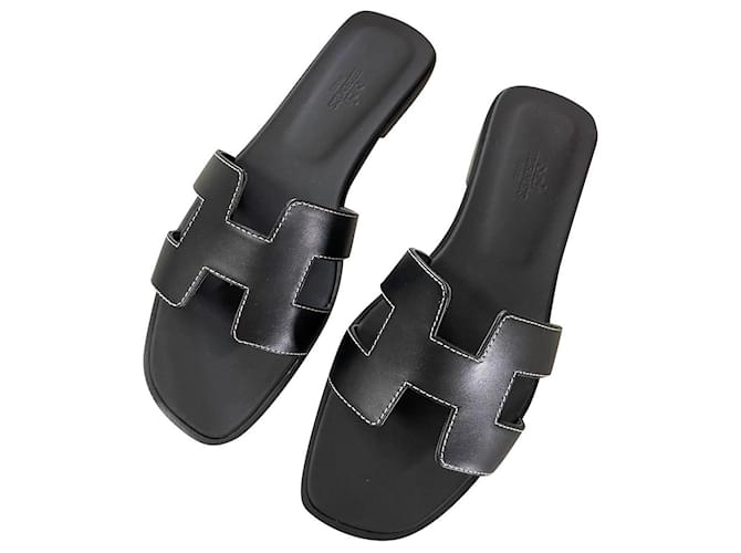 Hermès Oran Hermes black sandals Leather  ref.509013
