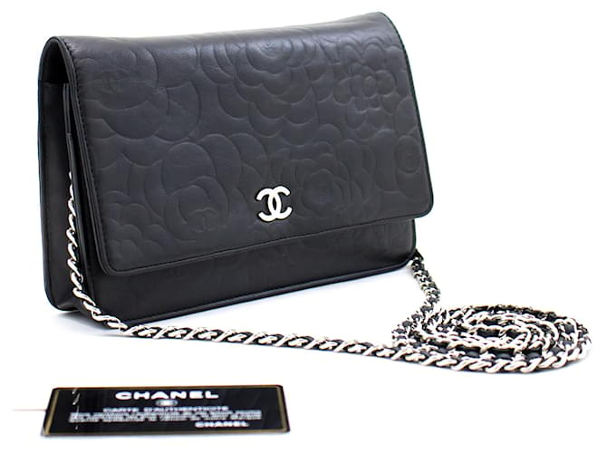 CHANEL Black Camellia Embossed Wallet On Chain WOC Shoulder Bag SV Leather  ref.509319