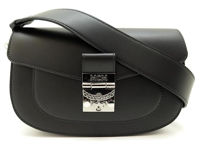 MCM Black Handbag  Black handbags, Handbag, Leather